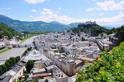 Aerial view of town against sky