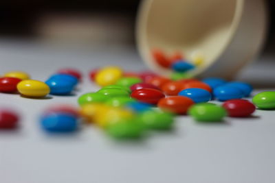 Close-up of multi colored balls on table