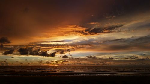 Scenic view of sea against sky at sunset