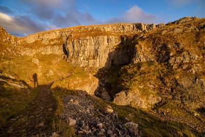 Shadow of people on rock