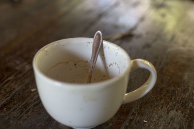 Close-up of coffee cup on table
