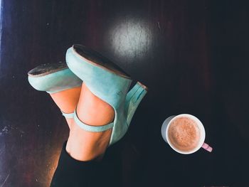 High angle view of coffee cup on table