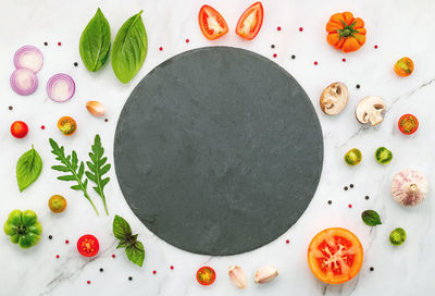 High angle view of fruits in plate on table