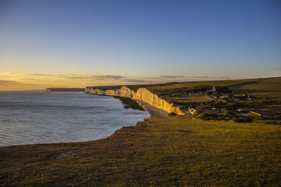 Scenic view of sea against sky during sunset