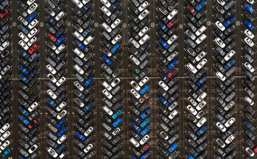 Aerial view of rows of new cars ready for export and import