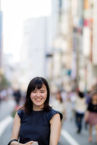 Portrait of smiling young woman