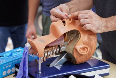 Midsection of man holding hands