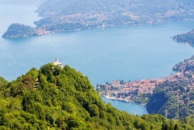 High angle view of buildings by sea