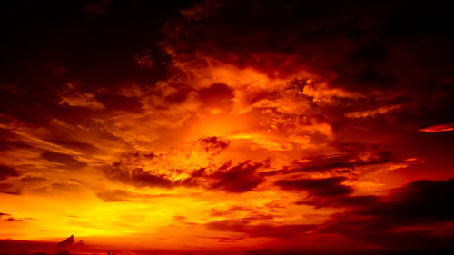 Low angle view of dramatic sky at sunset