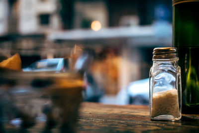 Close-up of glass jar on table at restaurant