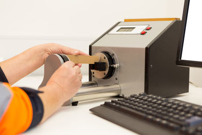 Close-up of person working on table