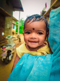 Portrait of cute smiling girl outdoors