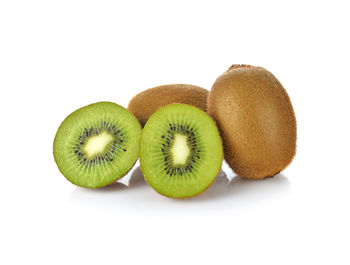 Close-up of fruits against white background