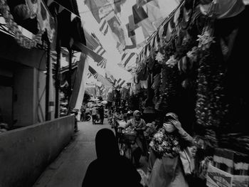 People at street market in city