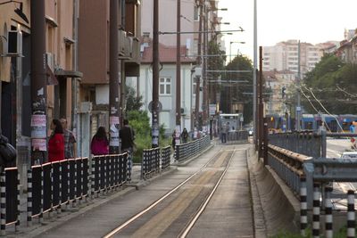 Tramway on street by buildings