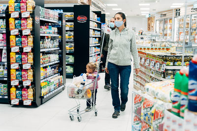 Panoramic view of people at store