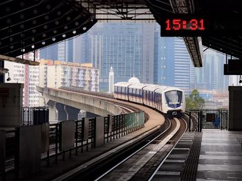 A rapidkl mrt train at a metro station in kuala lumpur