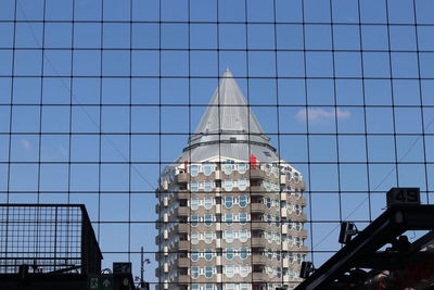 Low angle view of modern building against sky