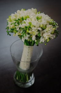 Close-up of white flowers in vase