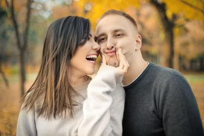 Happy mid adult couple enjoying during autumn