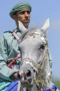 Portrait of man riding