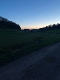 Scenic view of landscape against sky during sunset