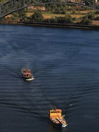 High angle view of ship sailing on sea against sky