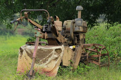 Abandoned truck on field