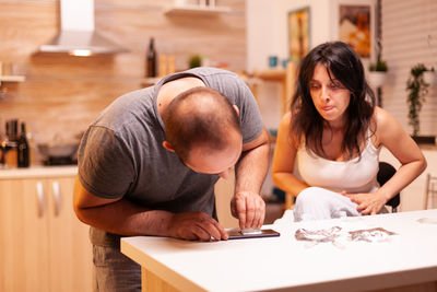 Portrait of woman working at table