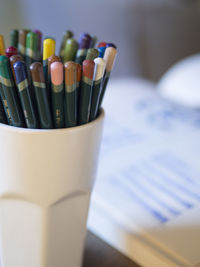 Close-up of pencils in desk organizer