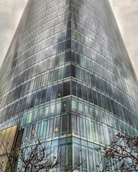 Low angle view of modern building against sky