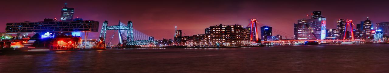 Illuminated city buildings at night