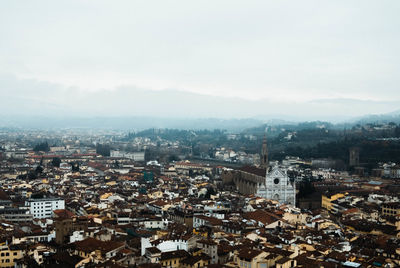 High angle shot of townscape against sky