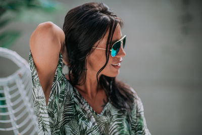 Young woman looking away outdoors