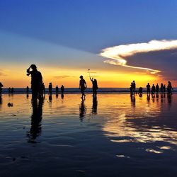 Scenic view of sea at sunset