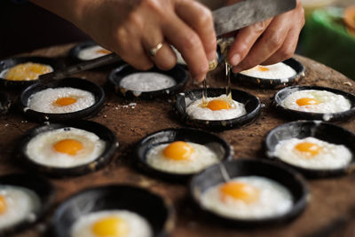 Midsection of person preparing food