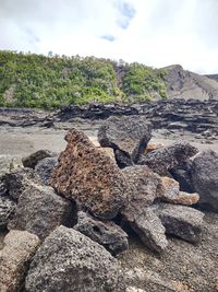 Rocks on land against sky