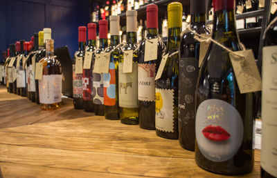 Panoramic shot of bottles on table