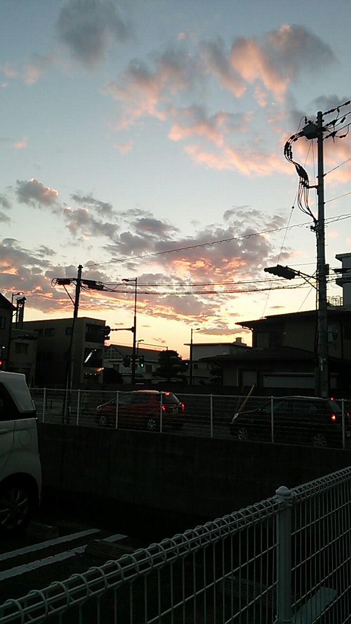 sunset, sky, cloud - sky, transportation, building exterior, street light, architecture, mode of transport, built structure, car, land vehicle, cloudy, orange color, city, street, cloud, outdoors, road, no people, dusk