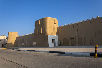 Low angle view of building against clear sky