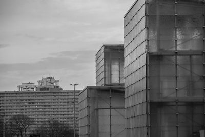 Modern buildings in city against sky