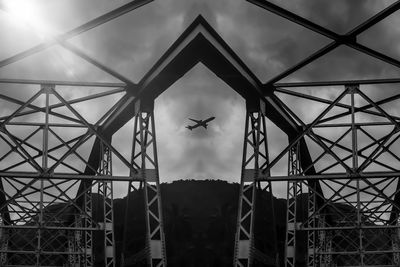 Low angle view of metal structure against sky