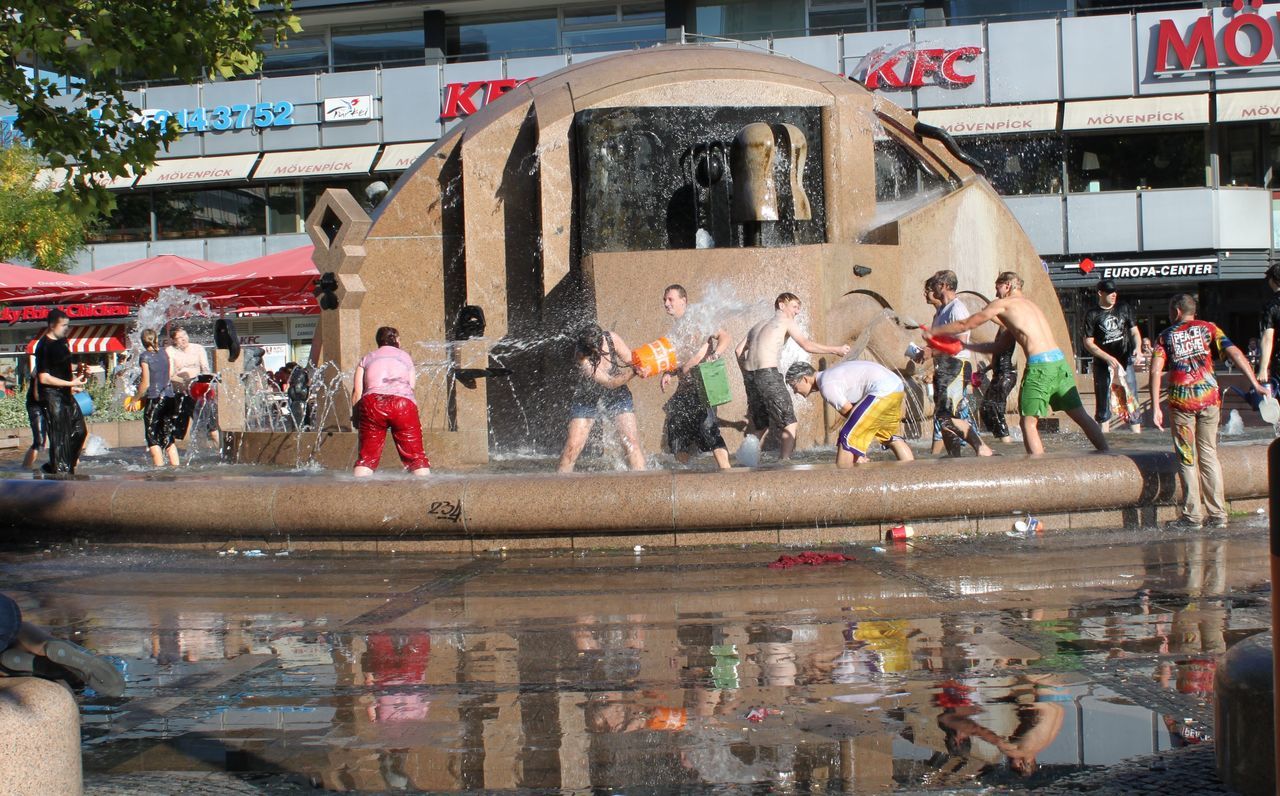 PEOPLE WALKING IN CITY