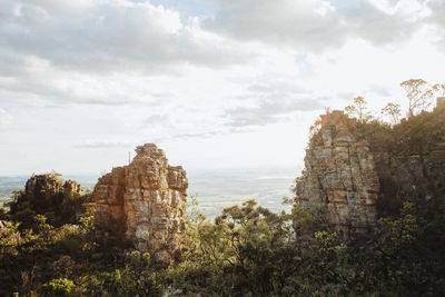 View of rock formation against landscape