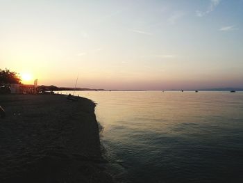 Scenic view of sea against sky at sunset