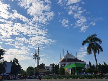 View of buildings against cloudy sky