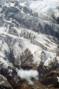 Aerial view of a snowy mountain range. the concept of uniqueness and diversity of nature.