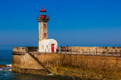 Historical felgueiras lighthouse built on 1886 and located at douro river mouth in porto city