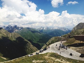 Scenic view of mountains against cloudy sky