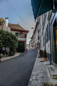 Narrow road along houses